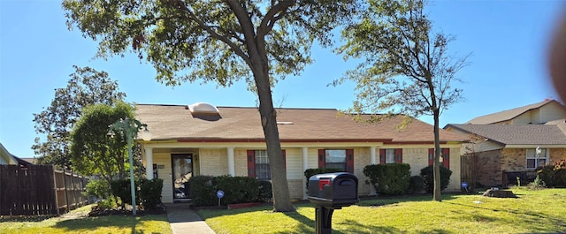 view of front of property with a front lawn