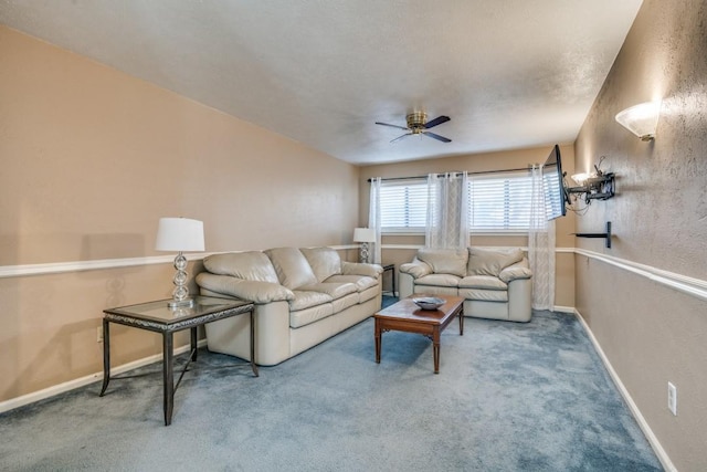 living room featuring ceiling fan and carpet flooring