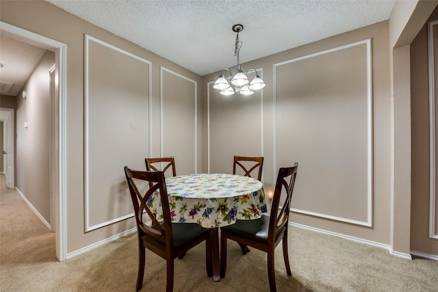 carpeted dining space featuring a textured ceiling and a notable chandelier