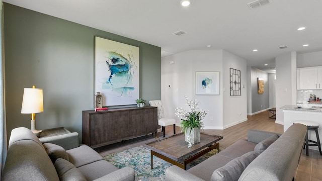 living room featuring light wood-type flooring