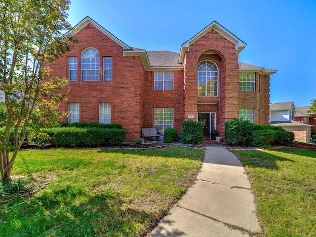 view of front of home with a front yard