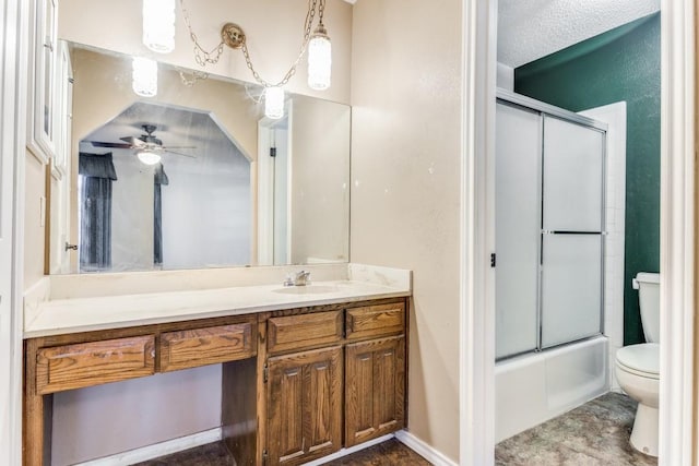 full bathroom with toilet, shower / bath combination with glass door, a textured ceiling, vanity, and ceiling fan