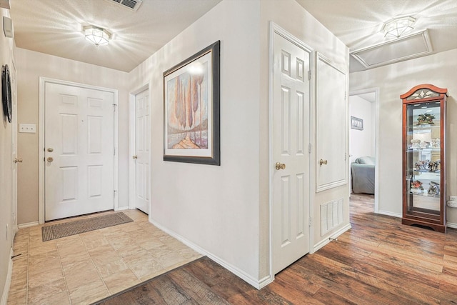 entryway featuring wood-type flooring