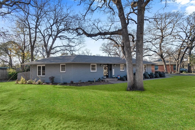 ranch-style home with a front yard