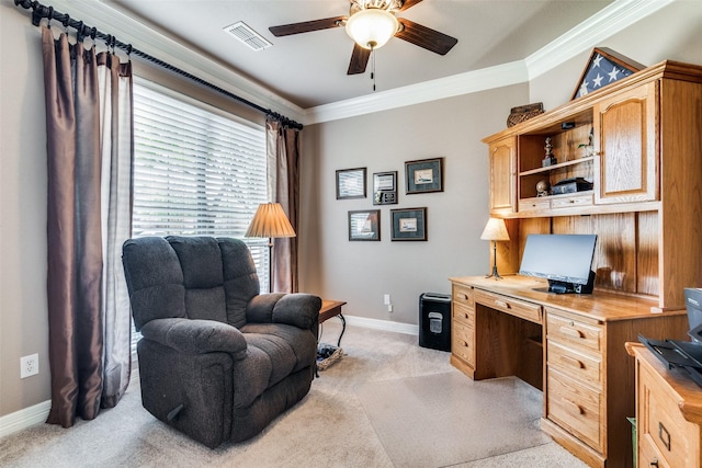 carpeted office featuring ornamental molding and ceiling fan