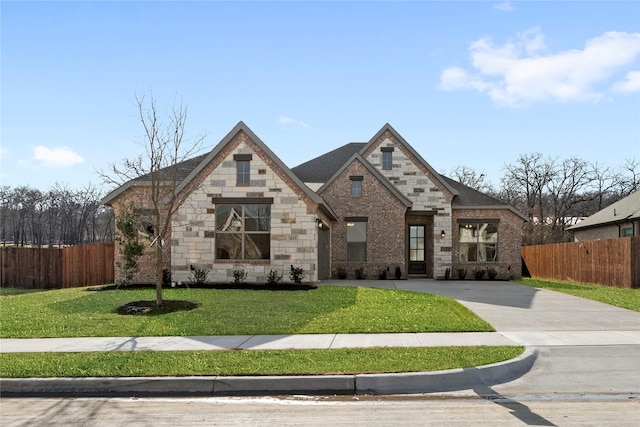 view of front of home with a front lawn