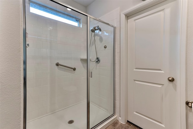 bathroom featuring an enclosed shower