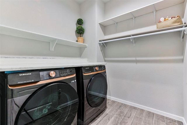 laundry room with washer and dryer