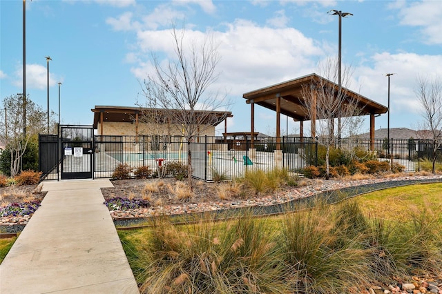 view of property's community featuring a gazebo and a pool