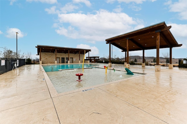 view of swimming pool featuring a patio