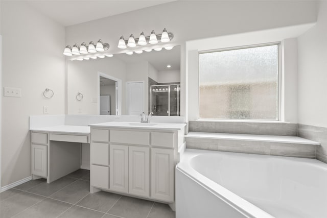 371 Freestall Dr, Midlothian, TX 76065 - bathroom featuring tile patterned floors, vanity, a bath, and a stall shower