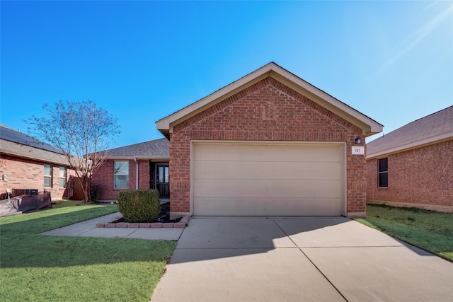 ranch-style house with a garage and a front lawn