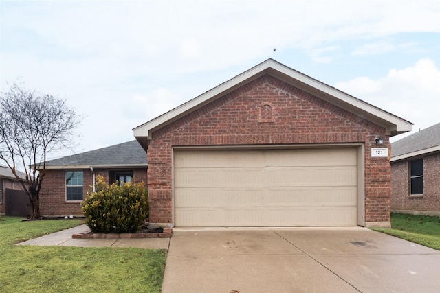 single story home featuring a garage and a front lawn