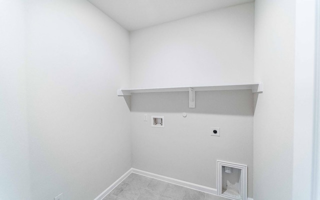 washroom featuring washer hookup, hookup for an electric dryer, gas dryer hookup, laundry area, and baseboards