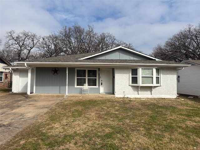 ranch-style house with a garage and a front yard