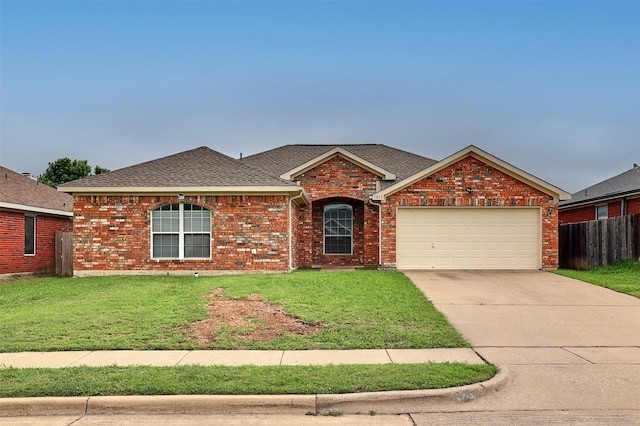 1013 Caleb St, Burleson, TX 76028 - view of front of house with a garage, driveway, a shingled roof, and brick siding