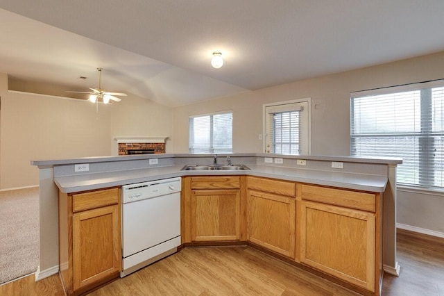 1013 Caleb St, Burleson, TX 76028 - kitchen featuring white dishwasher, light countertops, ceiling fan, a fireplace, and open floor plan