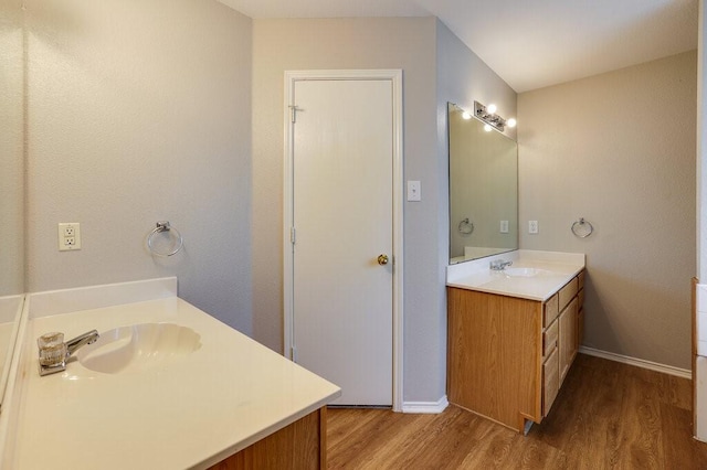 1013 Caleb St, Burleson, TX 76028 - bathroom with vanity and wood finished floors