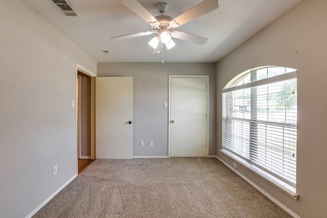 1013 Caleb St, Burleson, TX 76028 - unfurnished bedroom featuring carpet floors and a ceiling fan