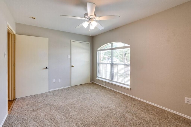 1013 Caleb St, Burleson, TX 76028 - unfurnished bedroom featuring carpet, ceiling fan, and a closet