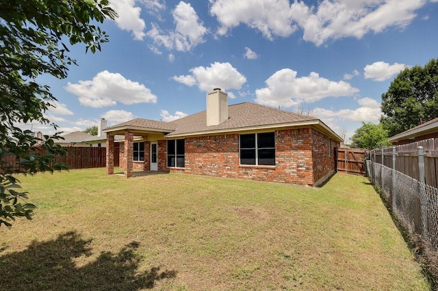 1013 Caleb St, Burleson, TX 76028 - back of house with brick siding, a fenced backyard, a chimney, and a shingled roof