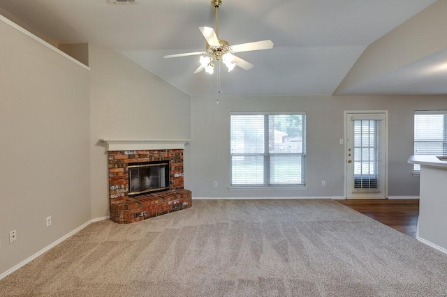 1013 Caleb St, Burleson, TX 76028 - unfurnished living room featuring carpet floors, lofted ceiling, a fireplace, and ceiling fan