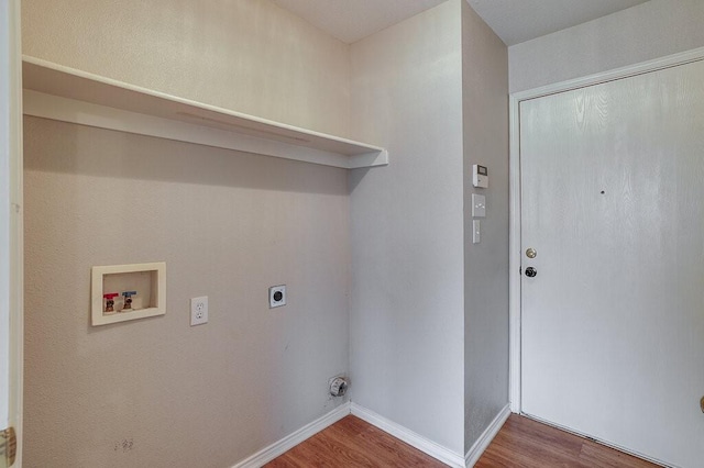 1013 Caleb St, Burleson, TX 76028 - laundry area with washer hookup, wood finished floors, and electric dryer hookup