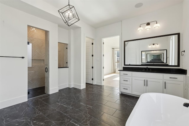 bathroom featuring vanity and separate shower and tub