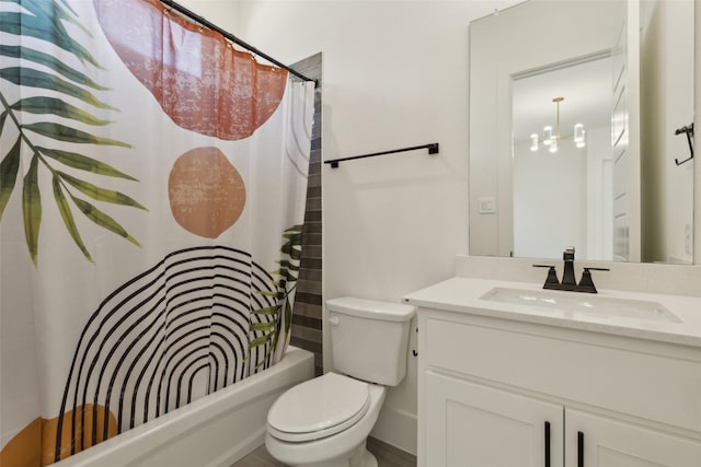 full bathroom featuring an inviting chandelier, vanity, toilet, and shower / bath combination with curtain