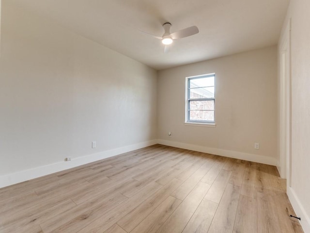 unfurnished room with ceiling fan and light hardwood / wood-style flooring