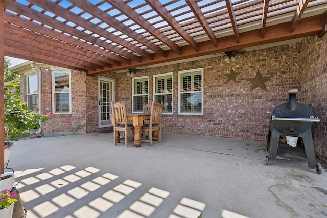 view of patio / terrace featuring grilling area and a pergola