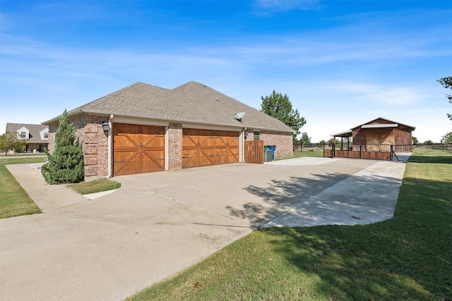 view of property exterior featuring a lawn