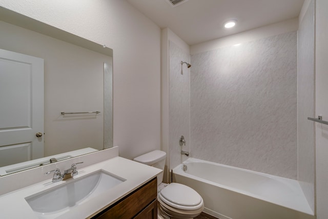 full bathroom with vanity, tub / shower combination, and toilet