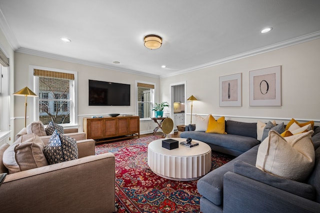 living room with ornamental molding