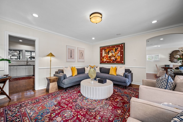 living room featuring ornamental molding and hardwood / wood-style floors