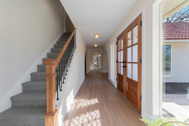 interior space featuring hardwood / wood-style flooring and french doors