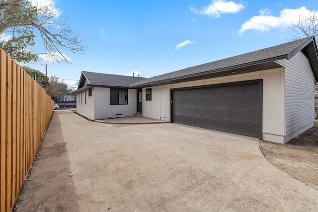 ranch-style house with a garage