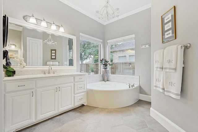 bathroom with an inviting chandelier, vanity, ornamental molding, tile patterned floors, and a bathing tub