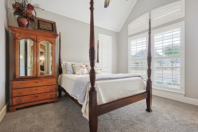 carpeted bedroom with vaulted ceiling, ceiling fan, and crown molding