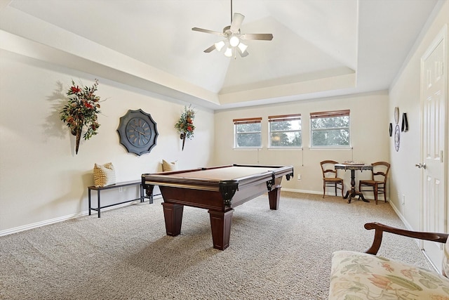 recreation room with lofted ceiling, pool table, a tray ceiling, ceiling fan, and carpet