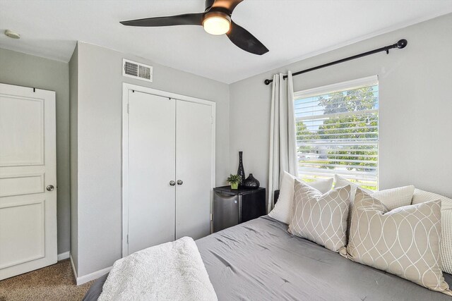 full bathroom with vanity, shower / tub combo with curtain, and toilet