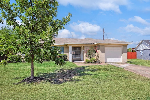 single story home featuring a garage and a front lawn