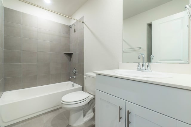 full bathroom with toilet, tile patterned flooring, shower / tub combination, and vanity