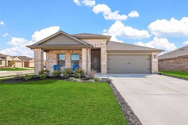 view of front of property with a porch, a garage, and a front lawn