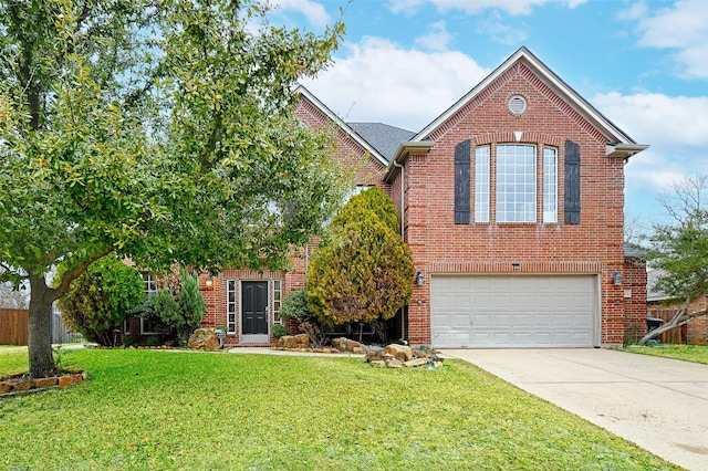 view of front property with a garage and a front lawn