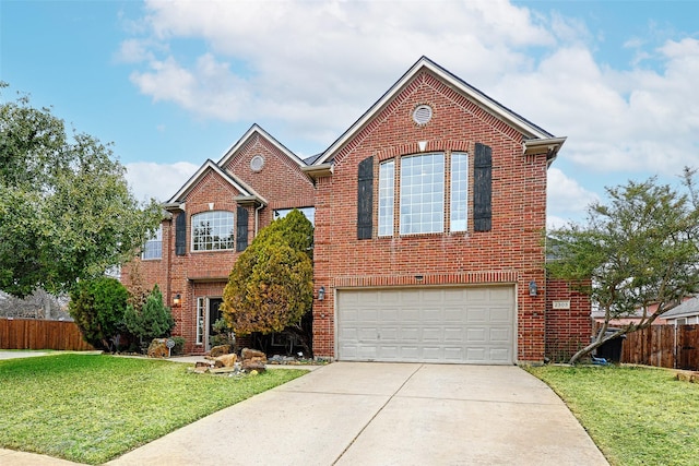 view of property with a garage and a front yard