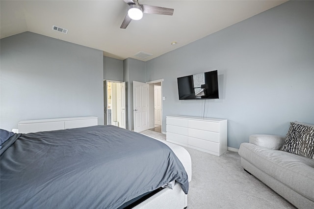 carpeted bedroom featuring lofted ceiling and ceiling fan