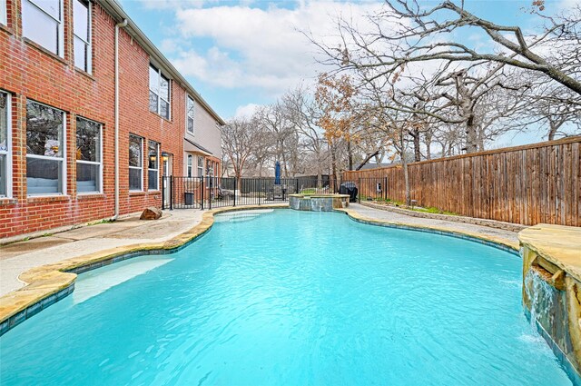 view of patio featuring a fenced in pool