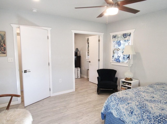 625 E Whitney St, Hamilton, TX 76531 - bedroom featuring wood finished floors, baseboards, and a ceiling fan