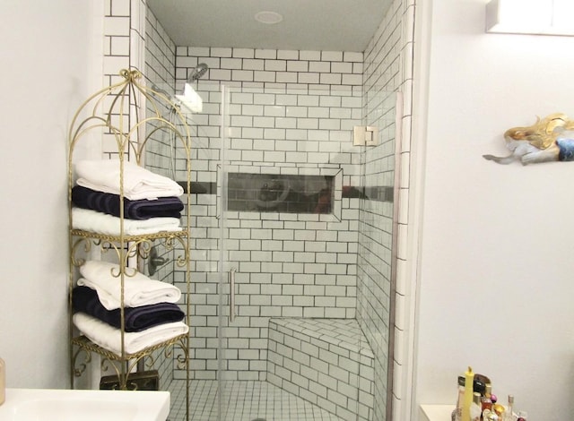 bathroom with an enclosed shower